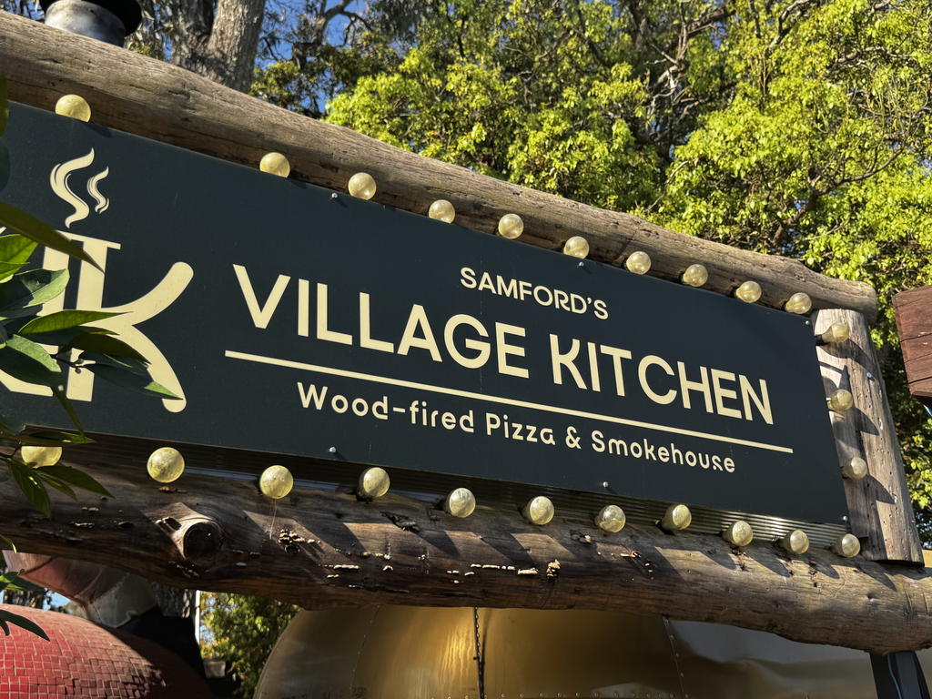 Samford's Village Kitchen wood-fired pizza and smokehouse sign