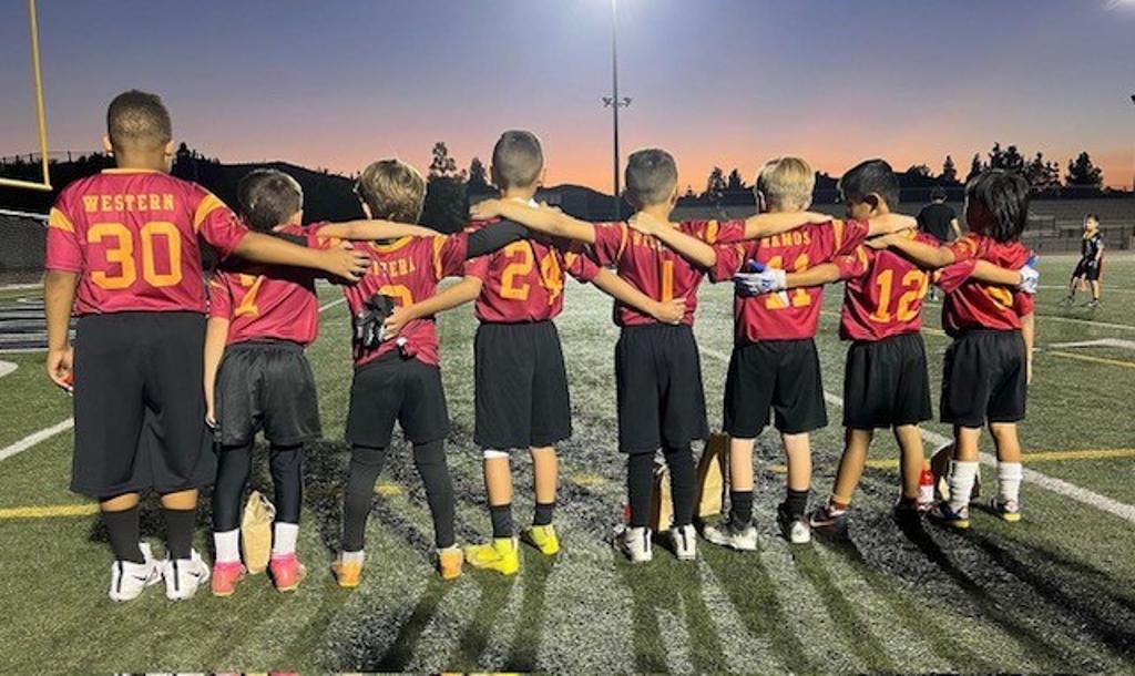 MVP Youth Flag Football Action Under Stadium Lights