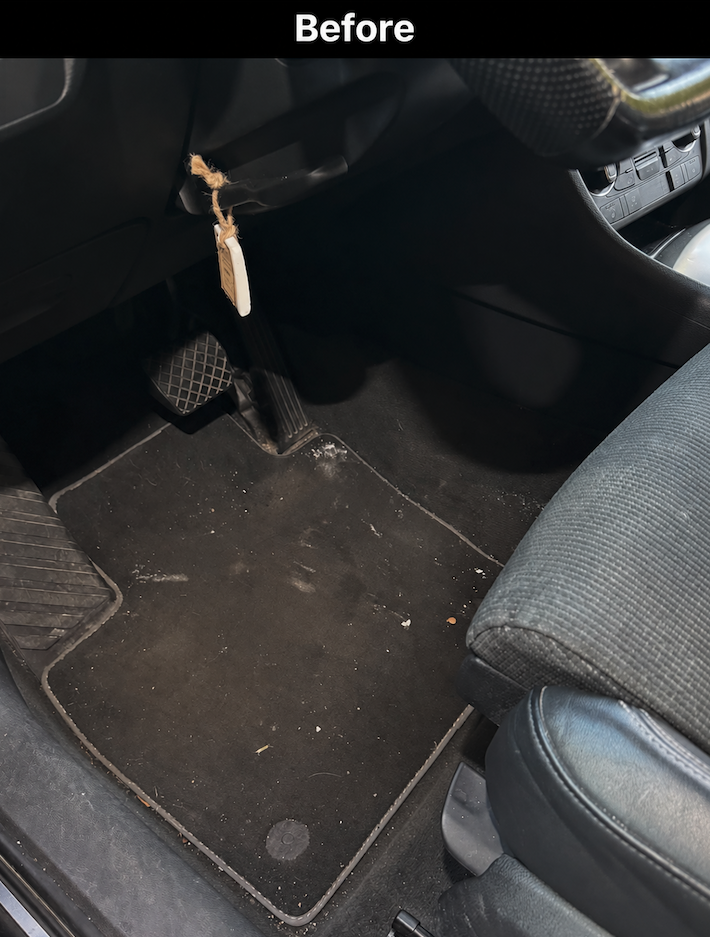 Dirty driver footwell, pedal area, and floor mat before detailing in Savannah