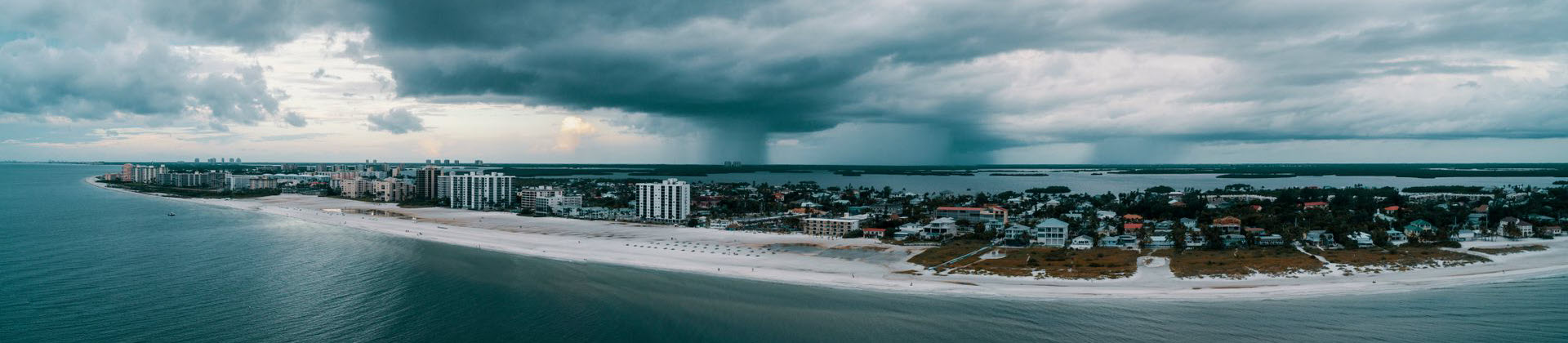 Panoramic aerial view of Tampa Bay coastline and waterfront communities served by New City Construction