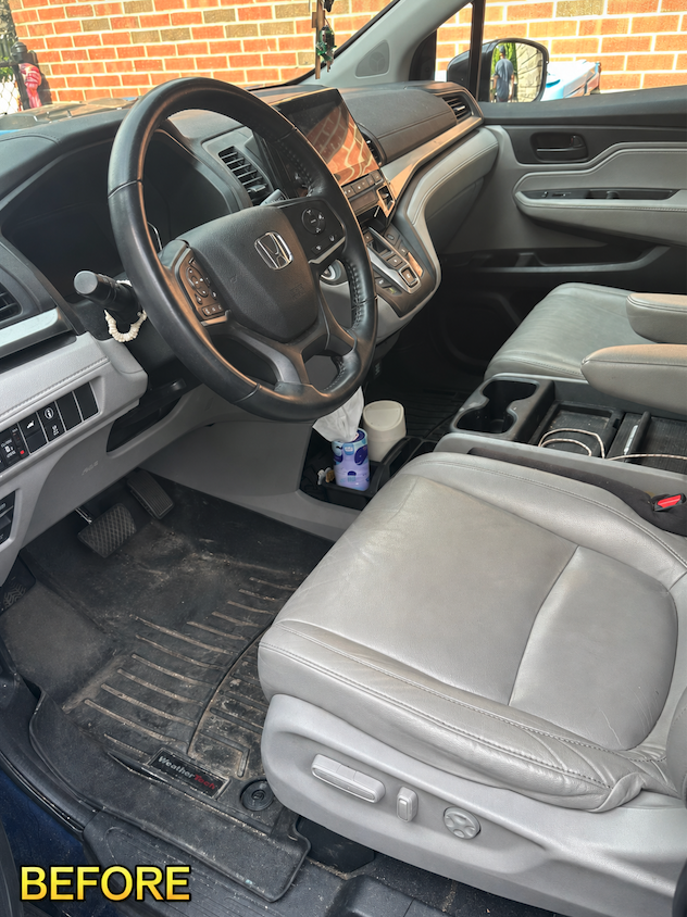 Honda front cabin and floor mat with dirt and debris before mobile detailing in Savannah