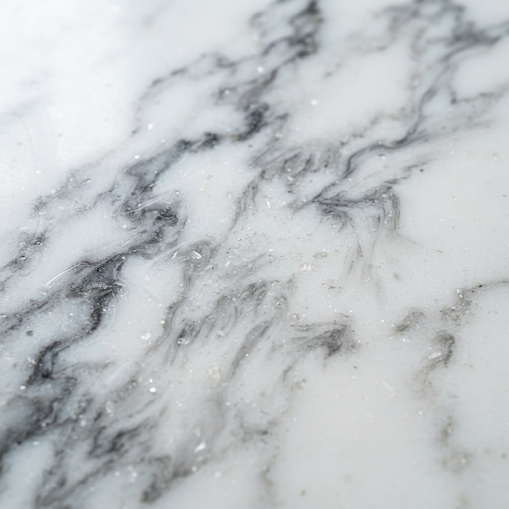 Alpine Calacatta macro detail showing surface texture and veining, Marble-Inspired design direction