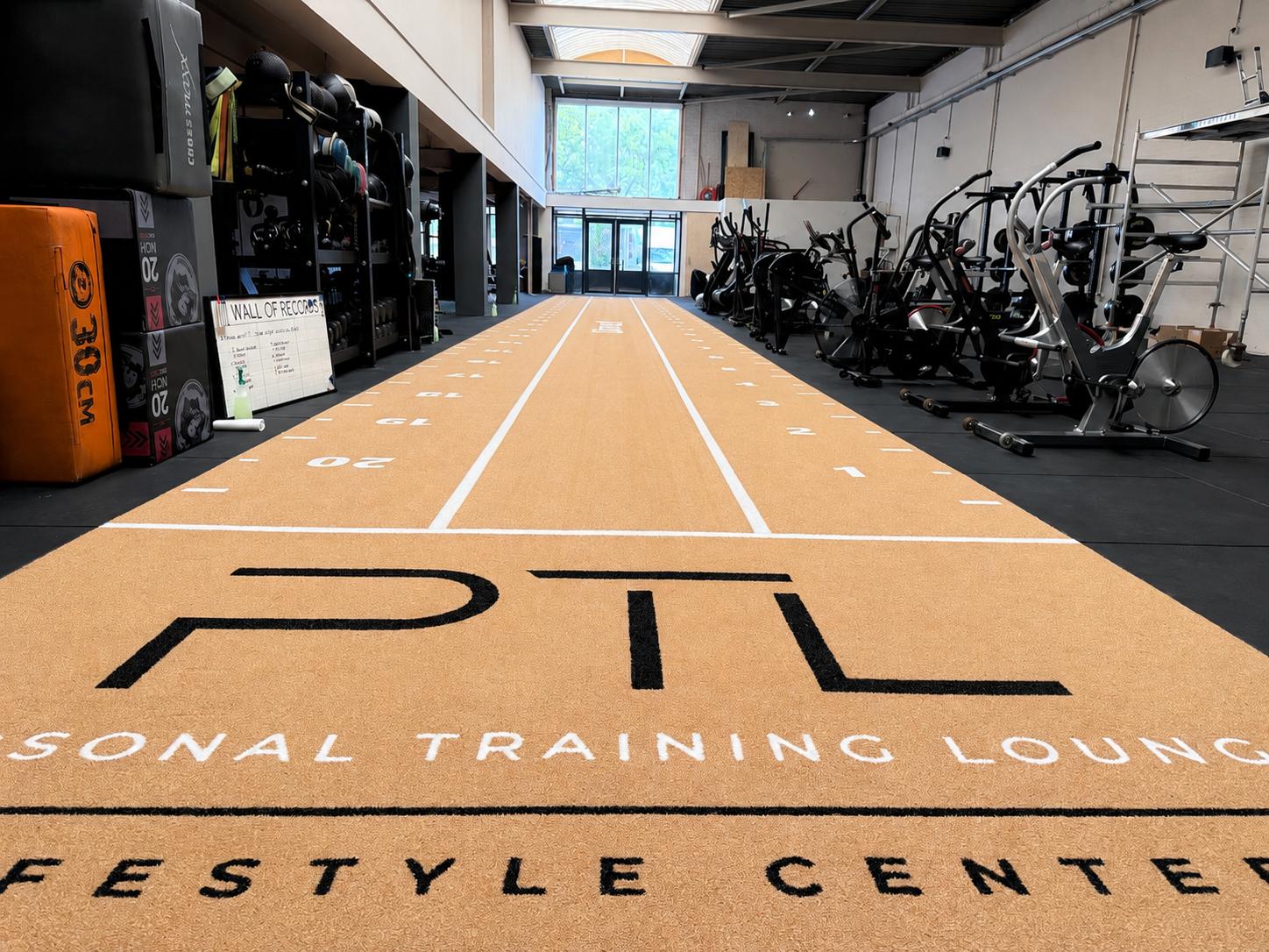 De trainingsruimte van PTL Lifestyle Center met loopstrook en apparatuur in Berkel en Rodenrijs