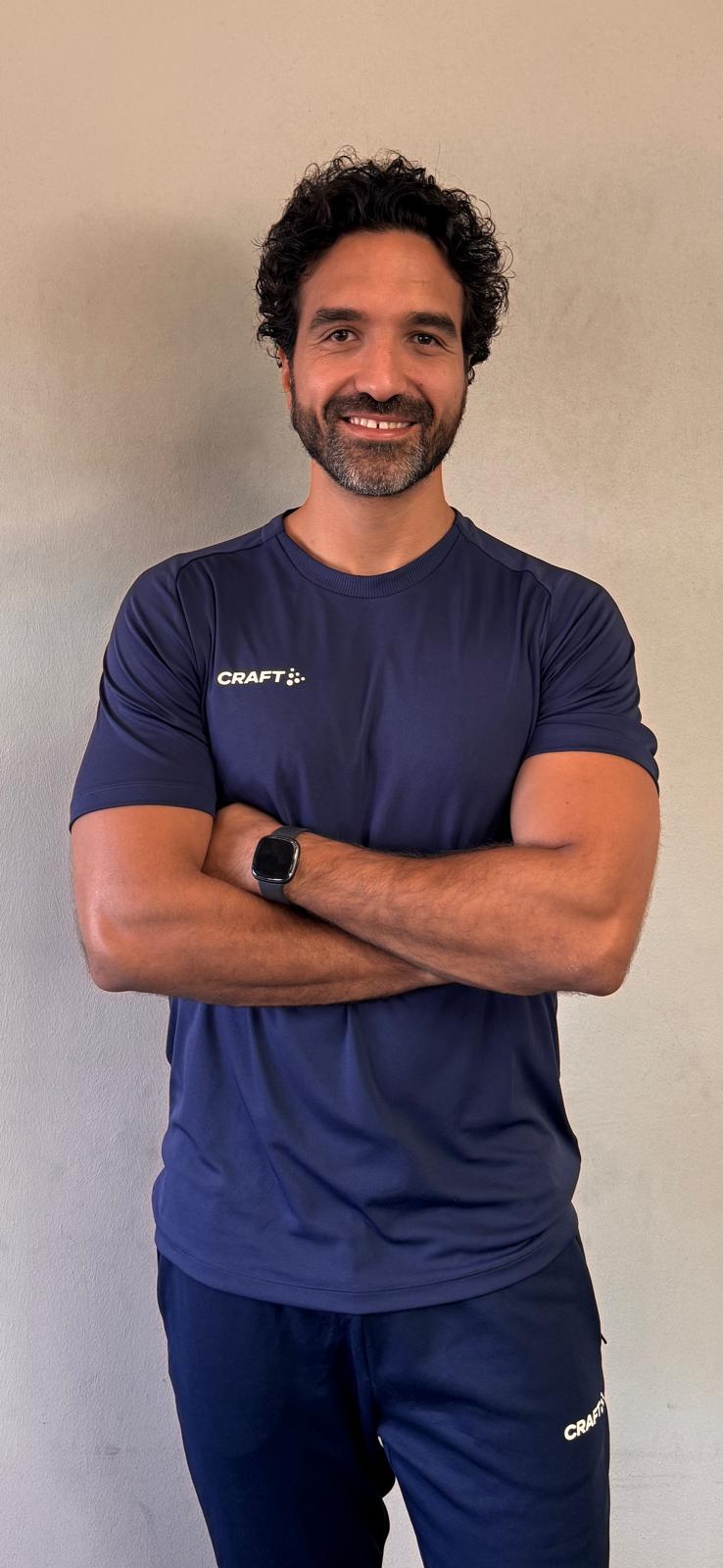 Portret van Mahmoud, personal trainer bij PTL