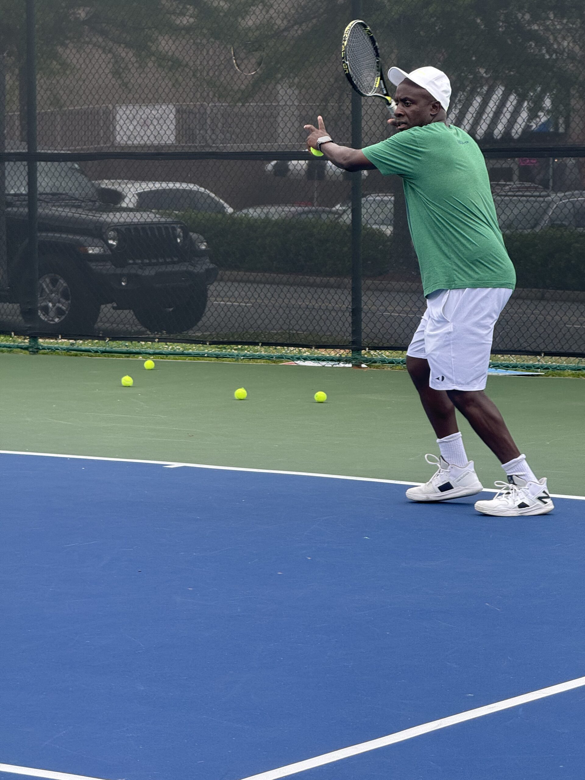 Simunyola Tennis court and junior players