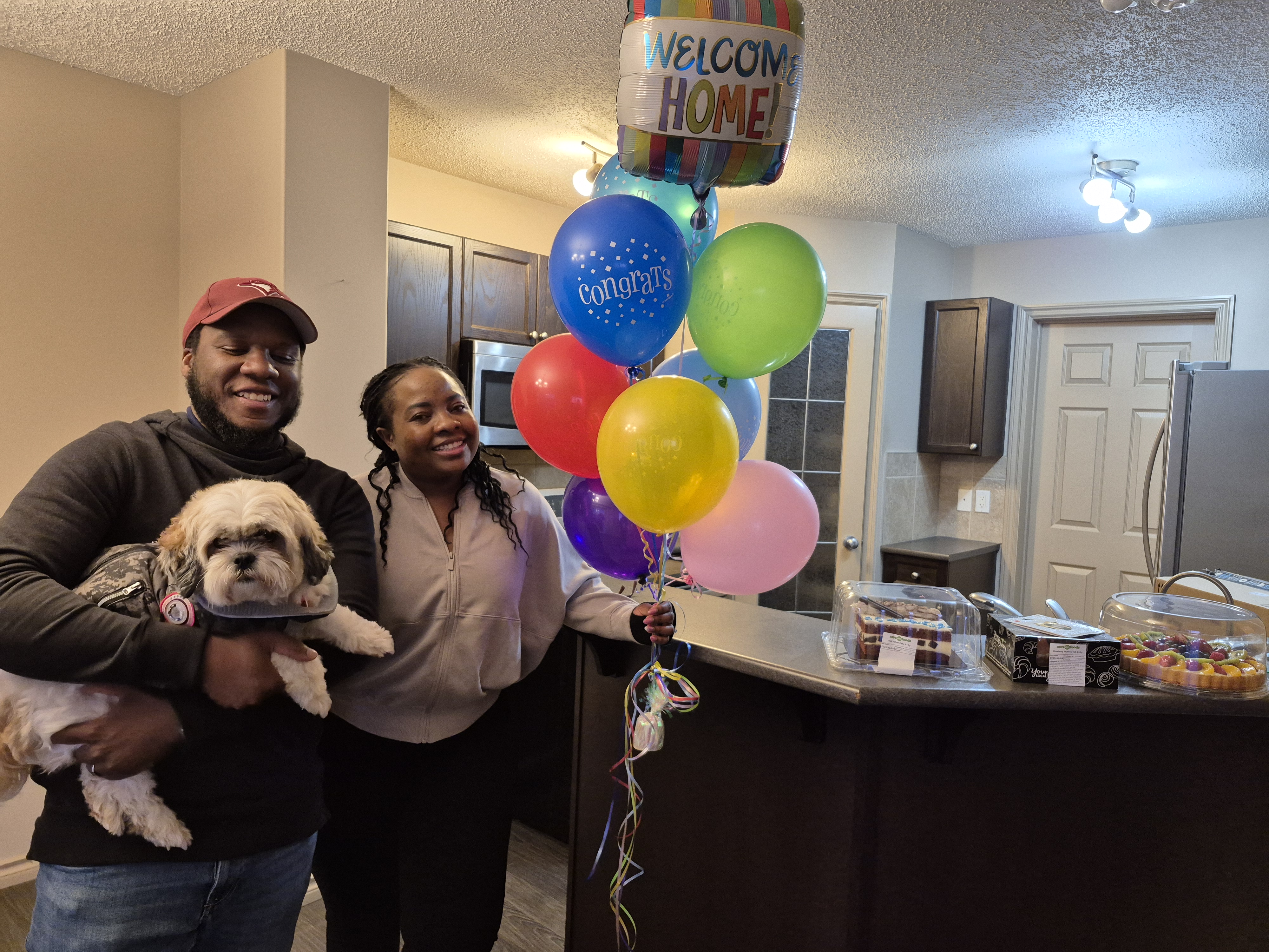 Welcome Home! Celebrating another happy family and their puppy on possession day
