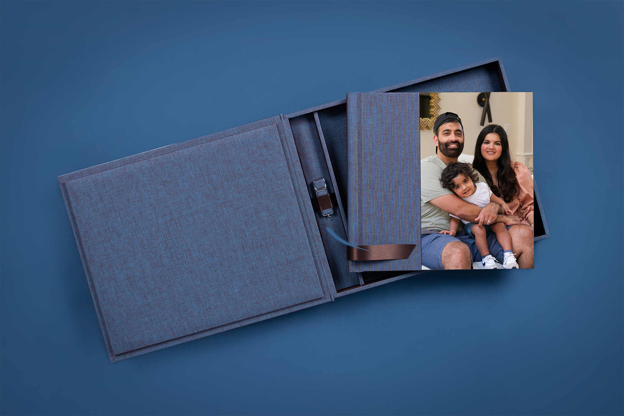Handcrafted heirloom album and matching presentation box featuring a family portrait