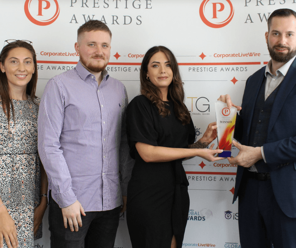 Onebase Media Team receiving Prestige Award