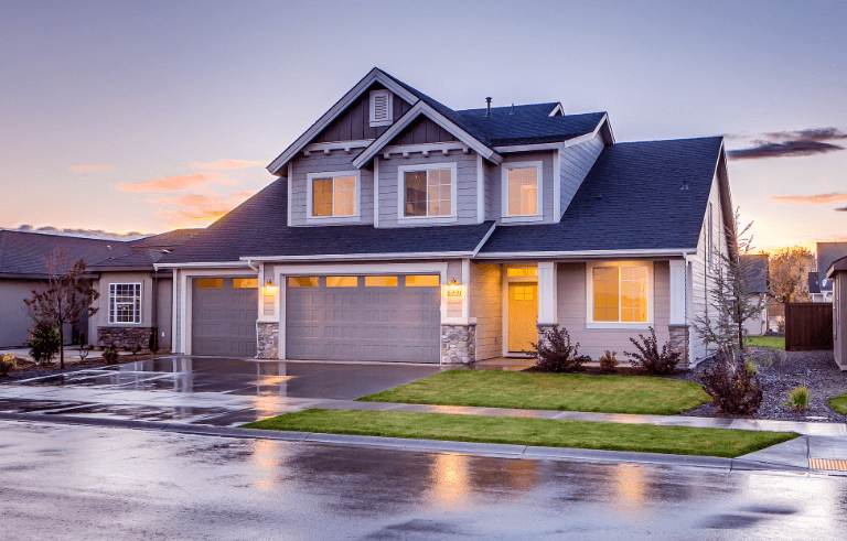 Modern home with luxury illuminated driveway