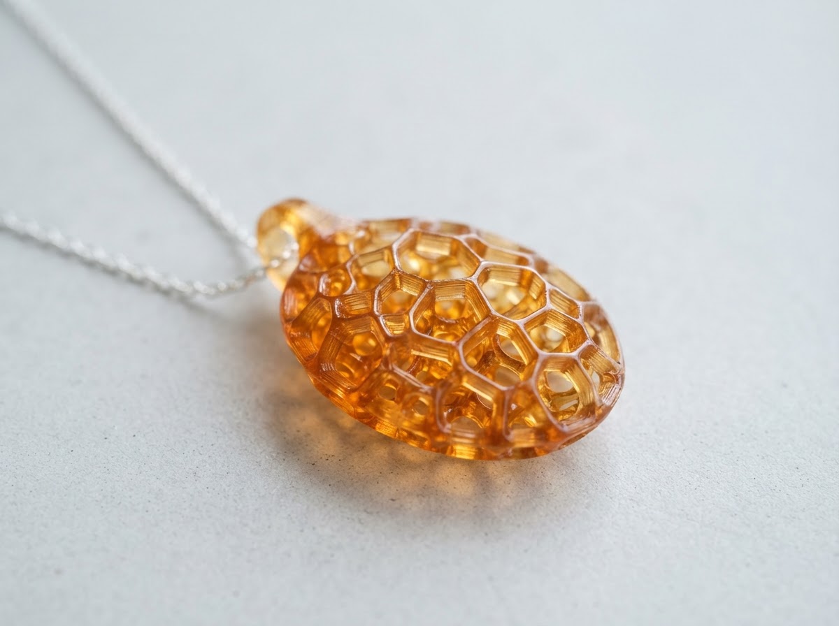 3D printed translucent amber resin jewelry lattice piece