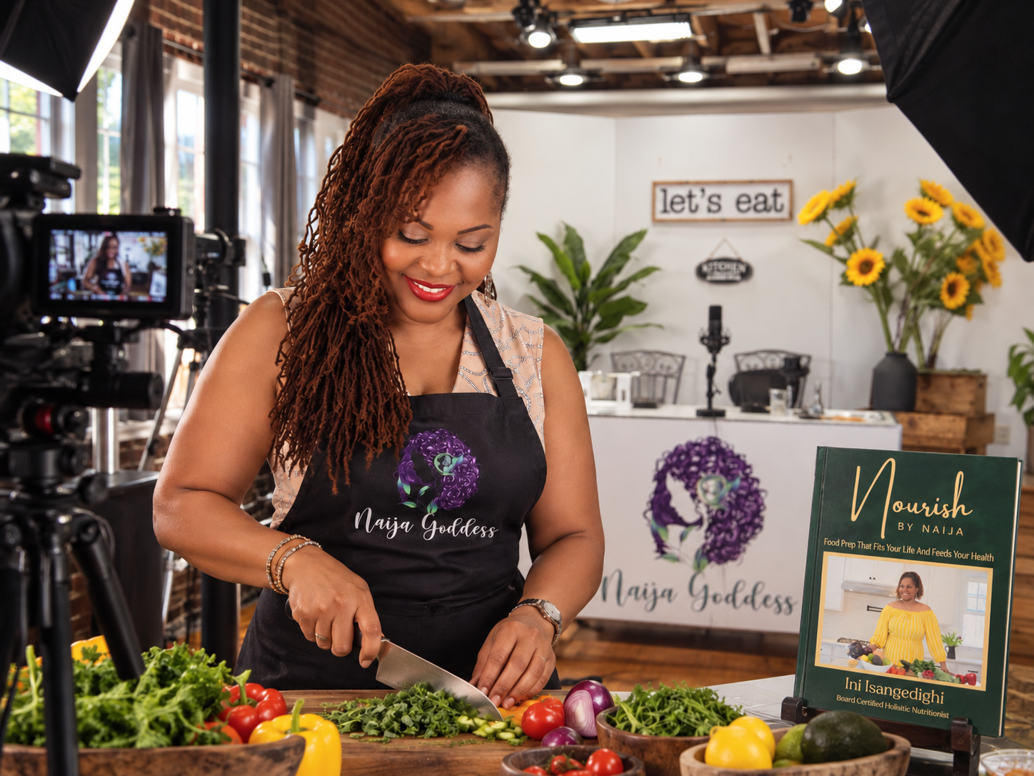 Dr. Naija preparing whole foods illustrating the Nourish by Naija method