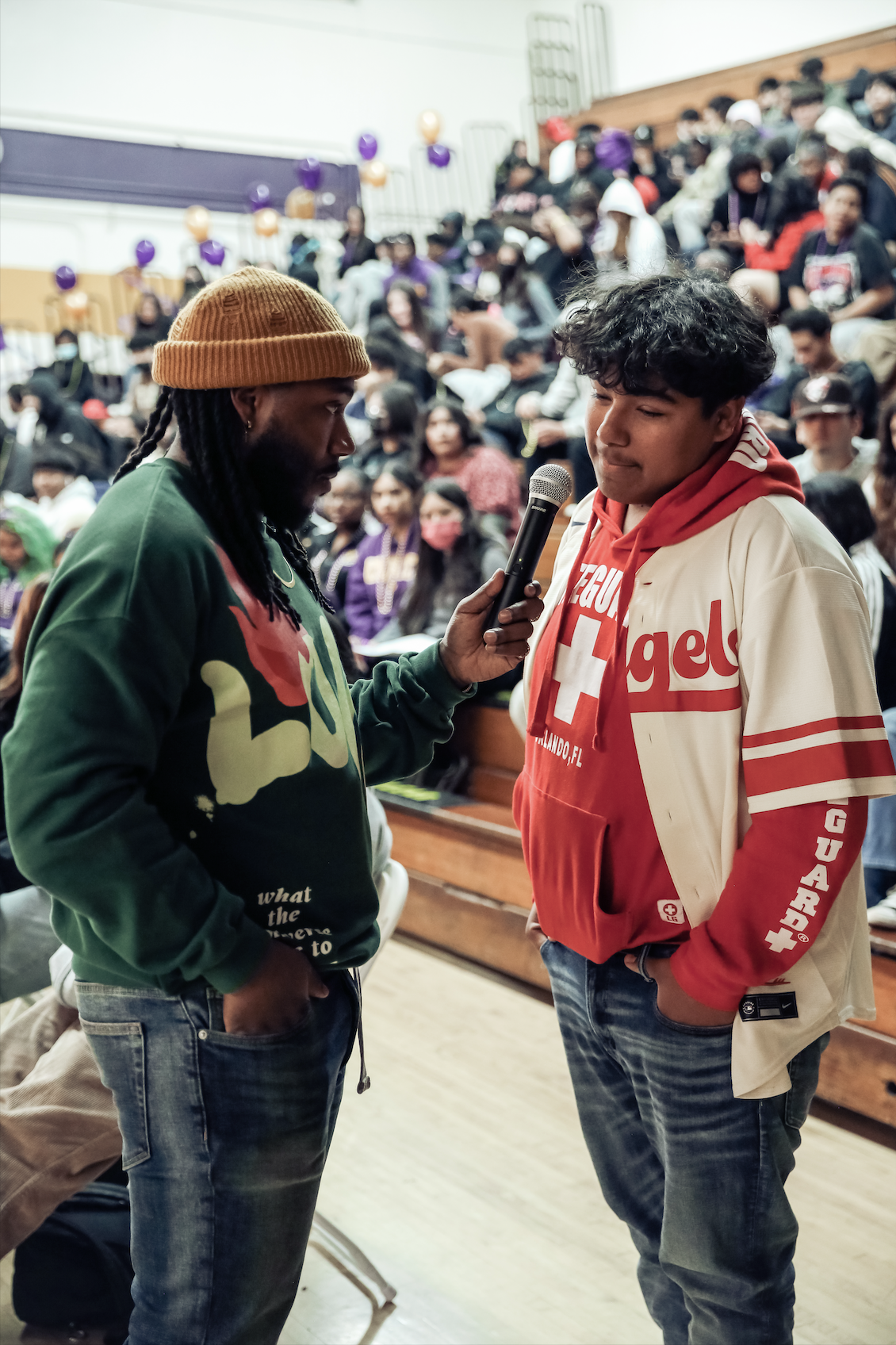 Oliver J. North engaging 1-on-1 with student on microphone