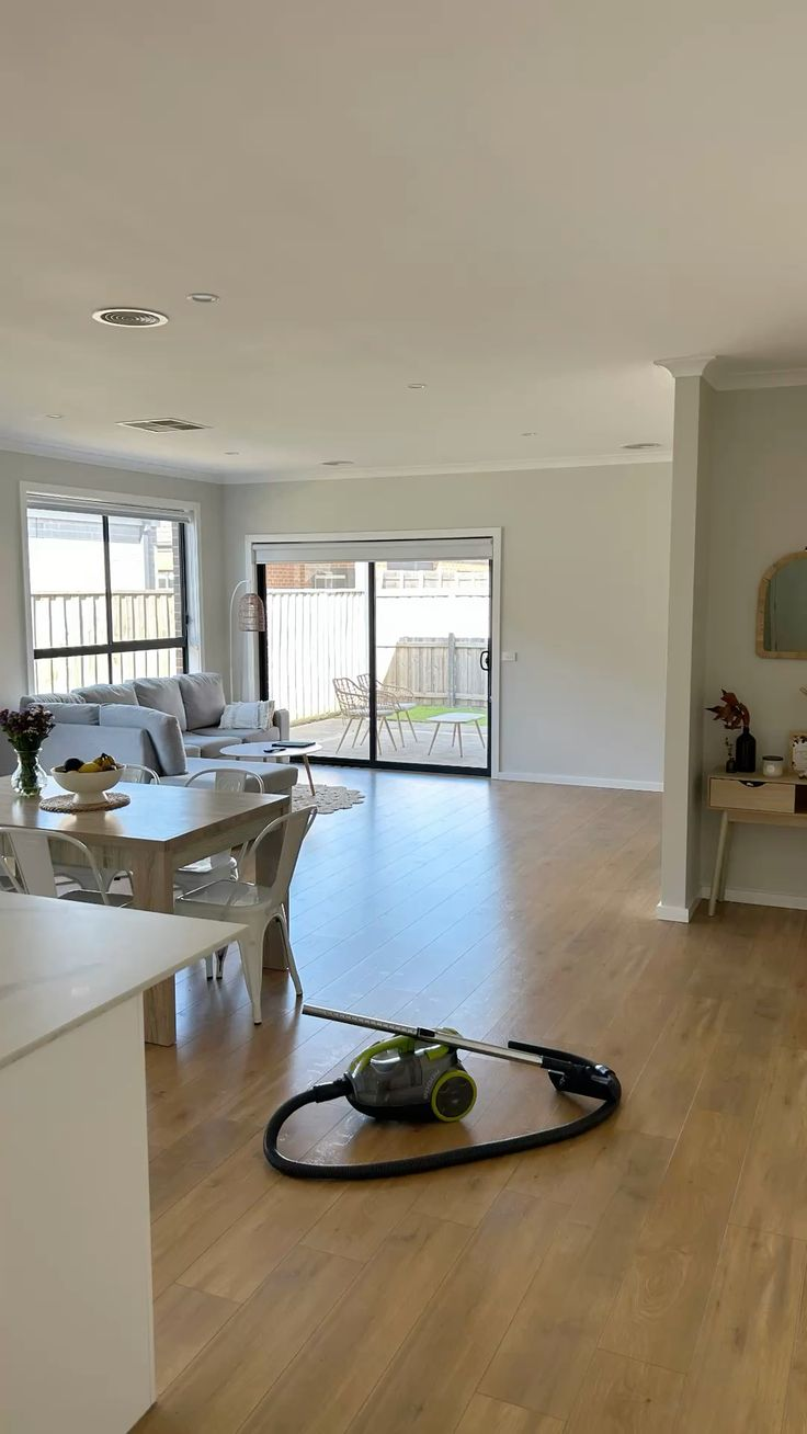 Spotless open living area floor detailed by Grace Shine Cleaning in Houston