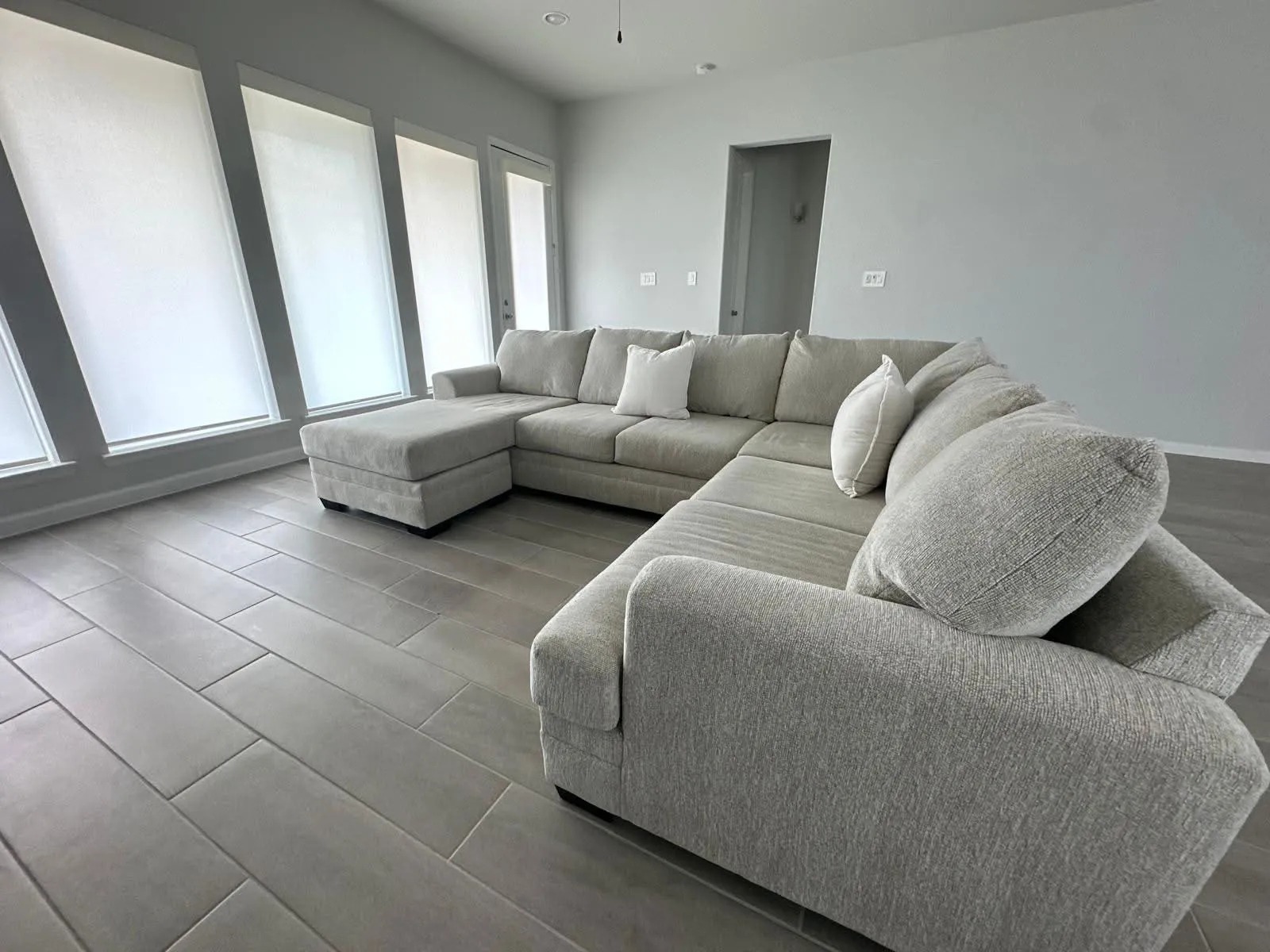 Living Room Tile Floor Polish & Sectional Detail
