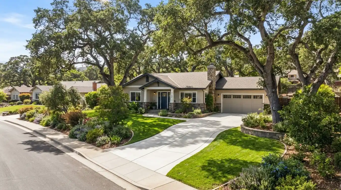 Atascadero residential driveway with mature trees and natural terrain