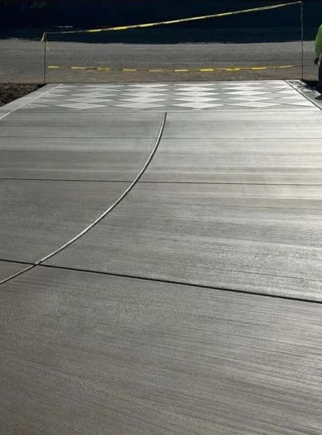 Concrete driveway with decorative diamond pattern finish