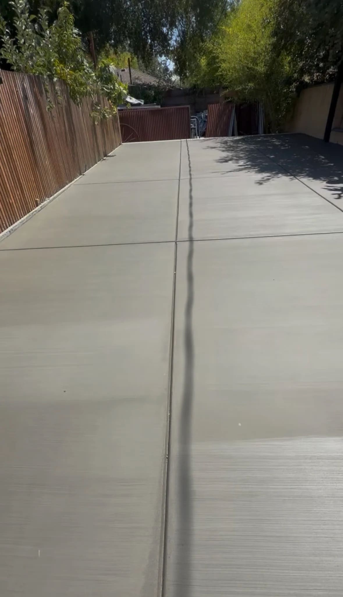 Smooth finished concrete driveway and side access flatwork