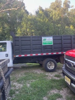 EB Landscaping LLC commercial equipment fleet and dump truck in NJ