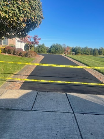 Asphalt Driveway & Custom Paver Border Apron