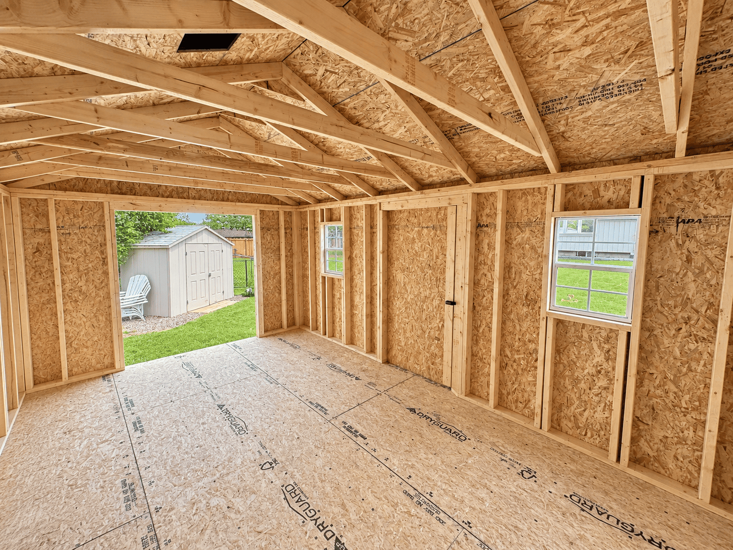 Interior framing of a Backyard Shed showing 2×4 wall studs at 16 inches on centre