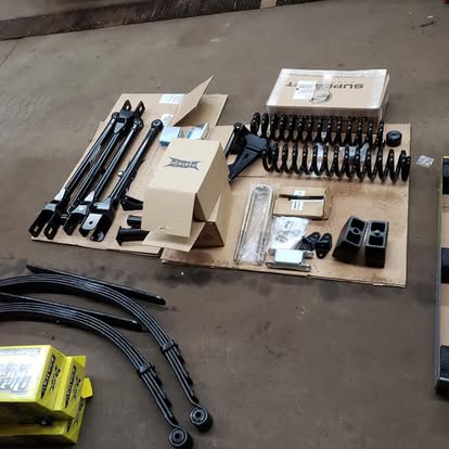 Complete lift kit springs and hardware package in shop