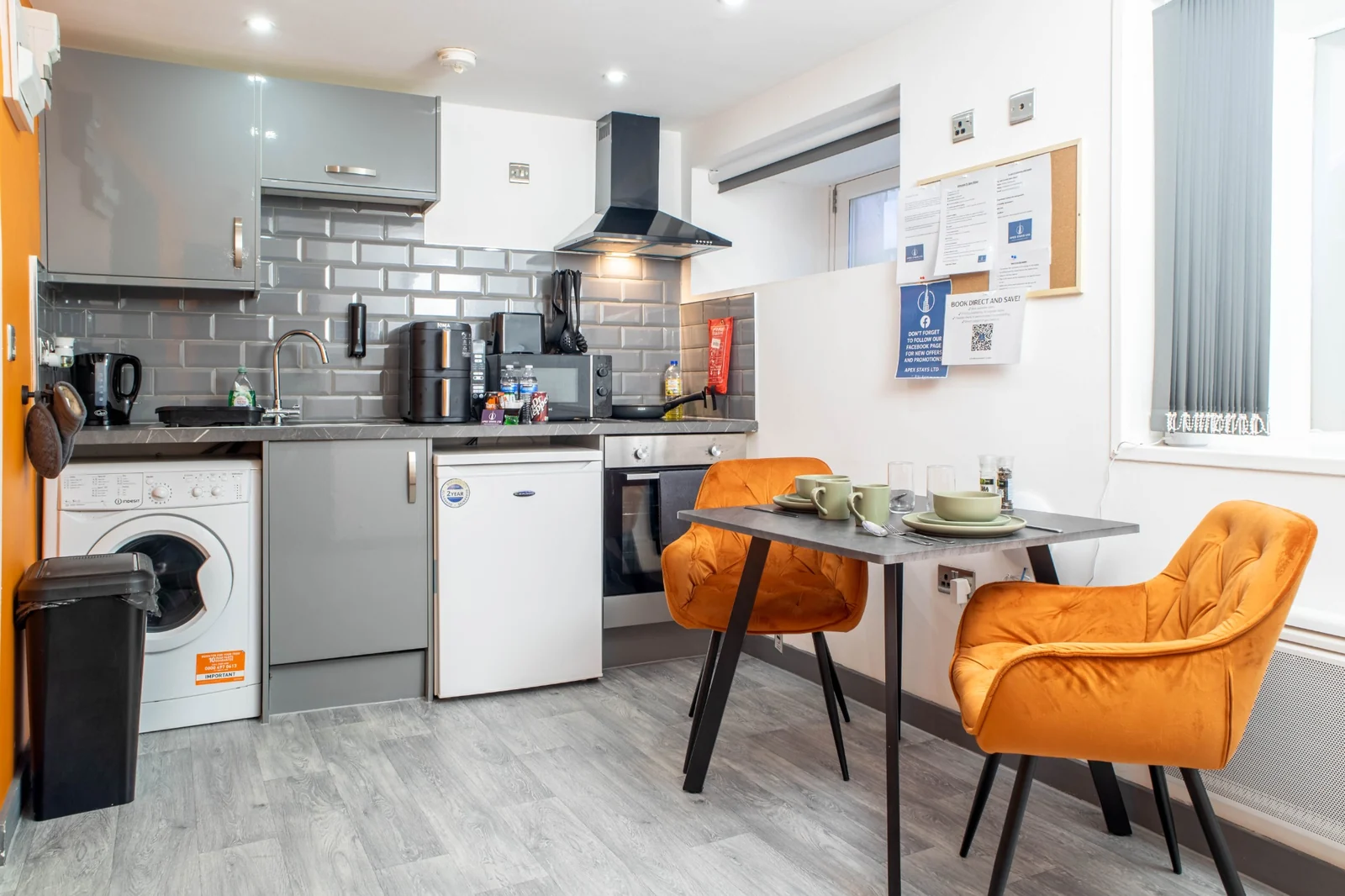 Kitchen and dining area of a studio apartment operated by Apex Stays in Bradford city centre