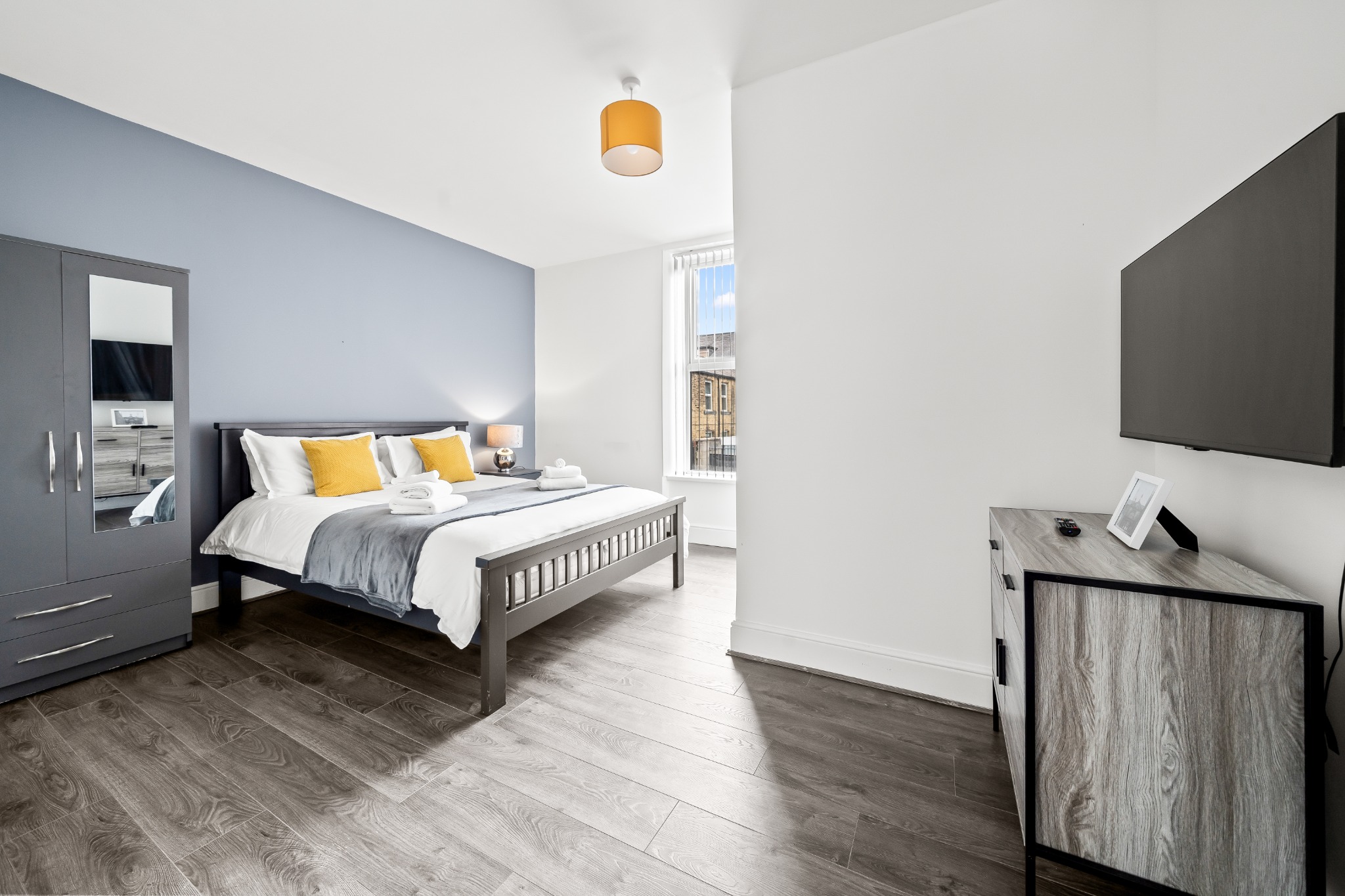 8A Coleridge Halifax — bright bedroom with double bed, wardrobe and smart TV