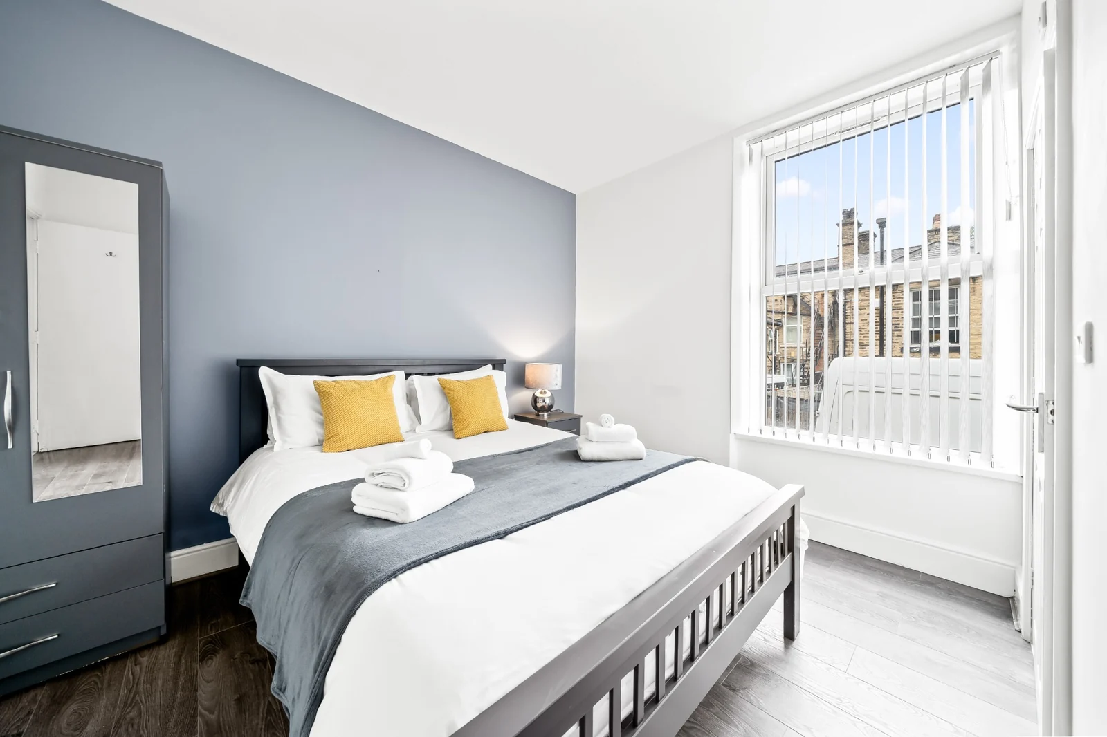 Bedroom in a one-bedroom Apex Stays managed serviced apartment in Halifax town centre