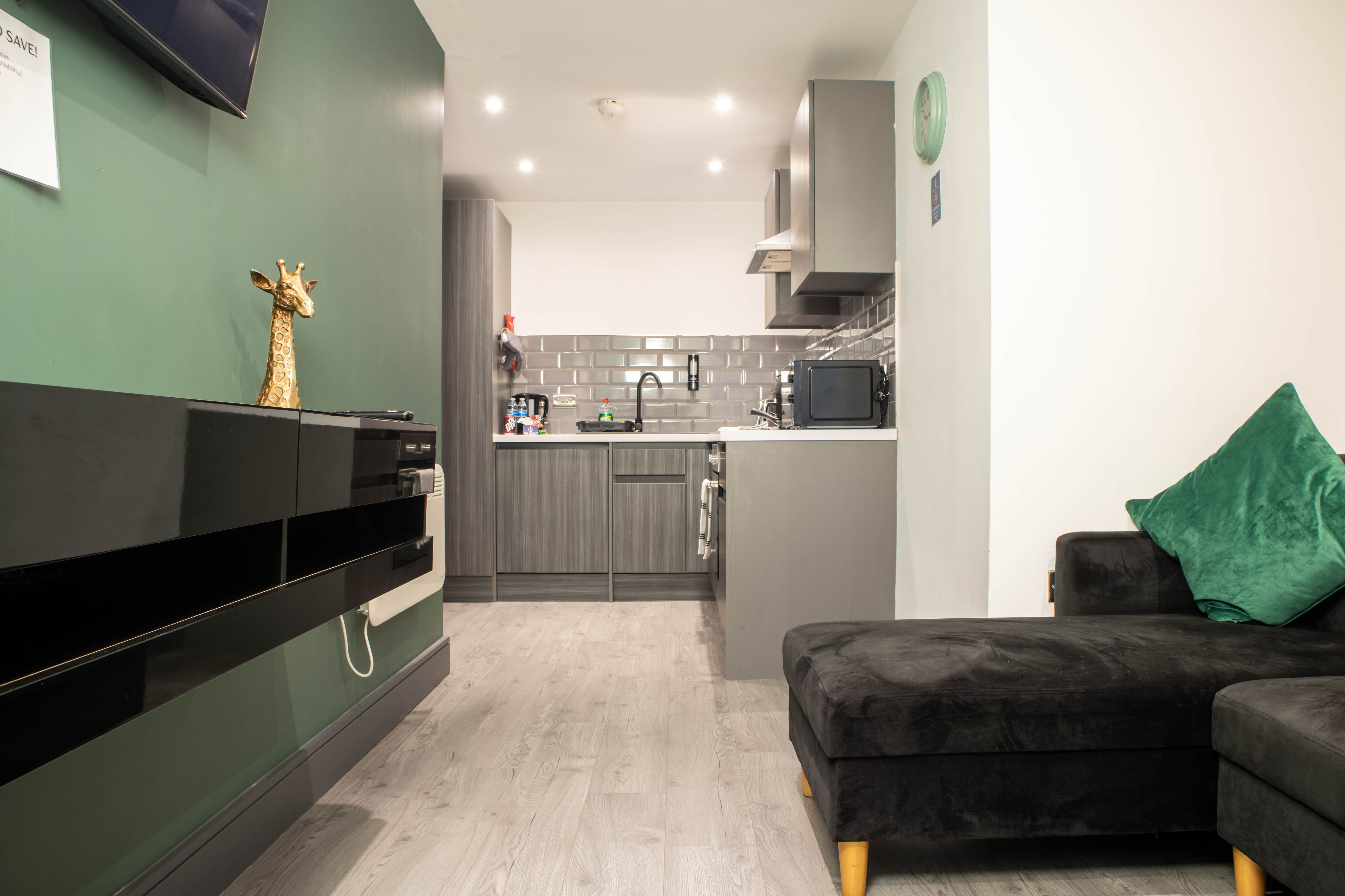Dining and lounge area of a one-bedroom apartment operated by Apex Stays in Bradford city centre