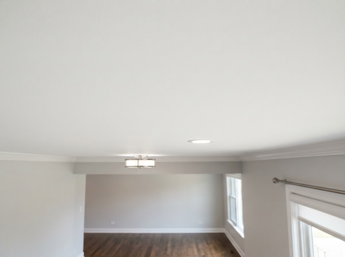 Refinished drywall ceiling inspected in a Glenview home