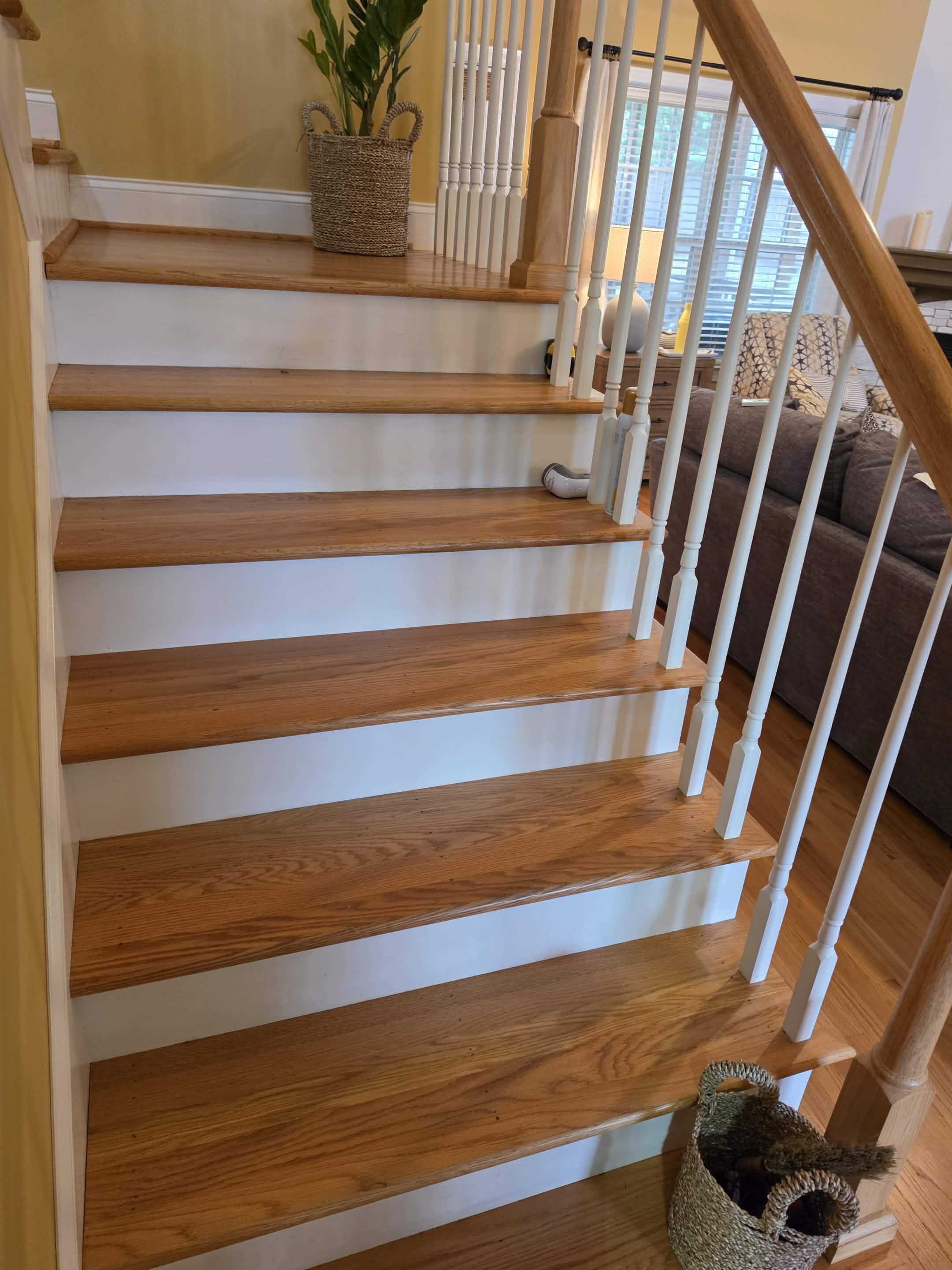 Refinished hardwood stairs by Graceful Flooring
