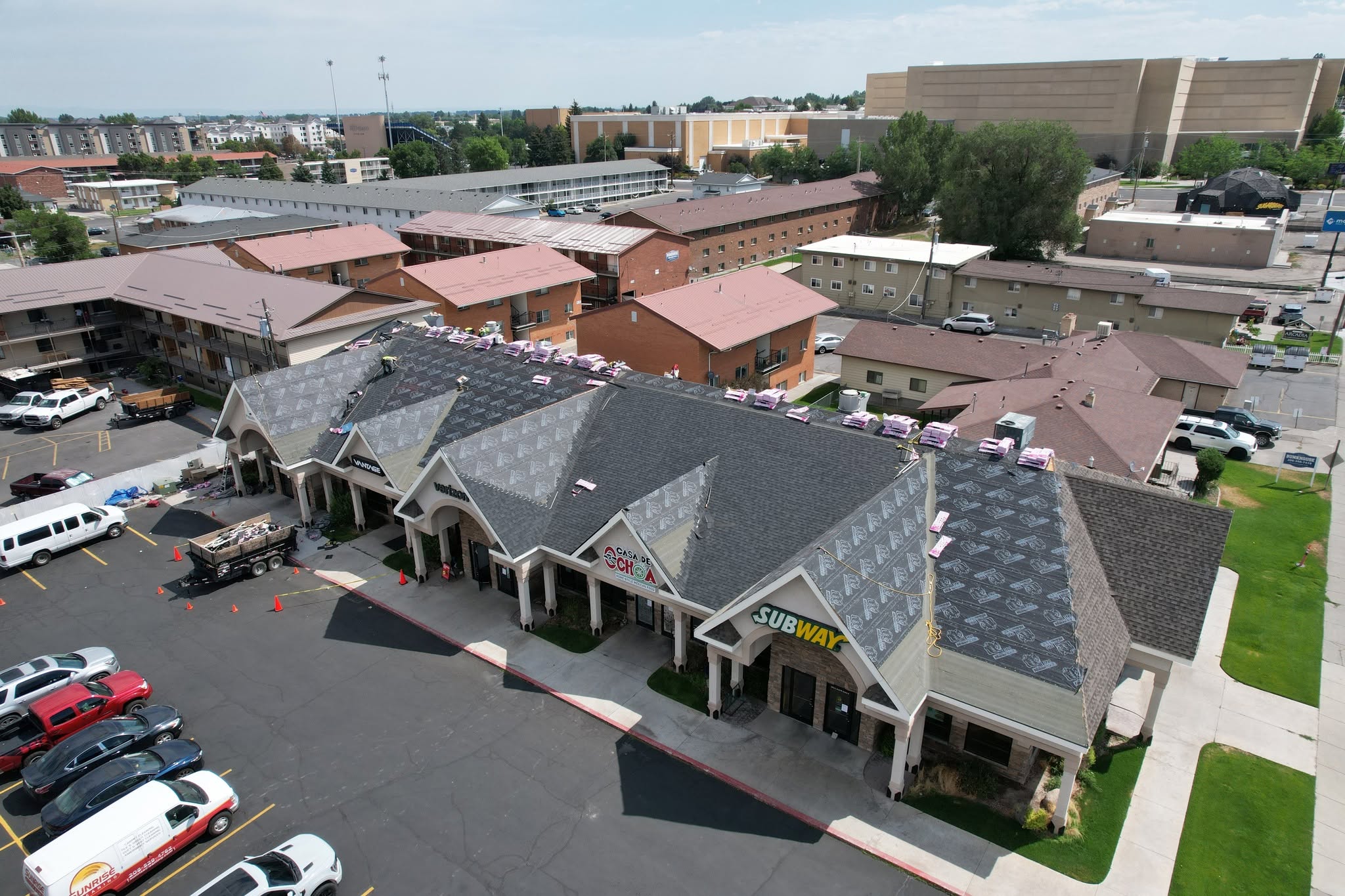 Roofers installing architectural shingles