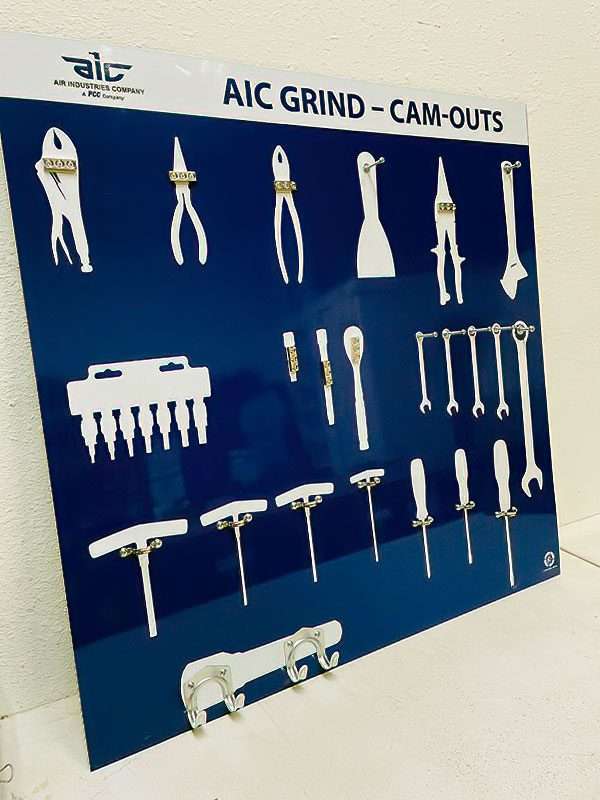 AIC Air Industries Company Cam-Outs precision tool shadow board in royal blue with crisp white silhouettes for wrenches, pliers, T-handle keys, and screwdrivers