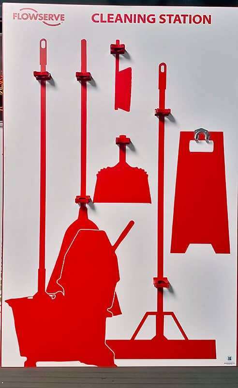 Flowserve Cleaning Station shadow board with vivid red silhouettes and spring-retention clips for mop bucket wringer, angle broom, floor squeegee, dustpans, and caution floor sign