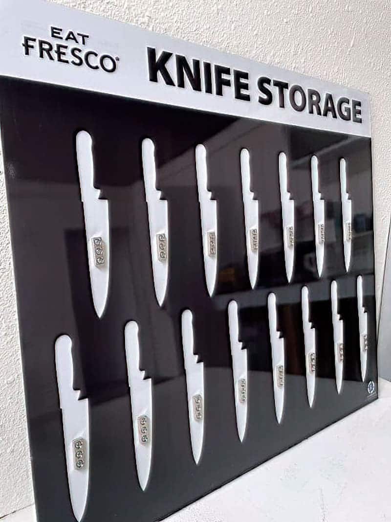 Eat Fresco Knife Storage sanitary shadow board in high-gloss black with crisp white silhouettes and secure magnetic retention blocks for commercial kitchen knives