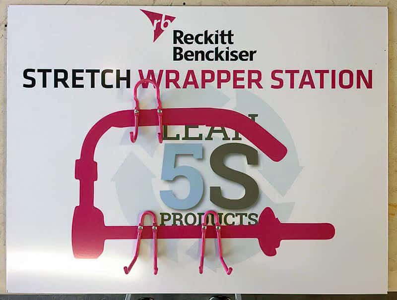 Reckitt Benckiser Stretch Wrapper Station shadow board with bright pink tool silhouette and custom retention hooks for pallet wrap dispenser