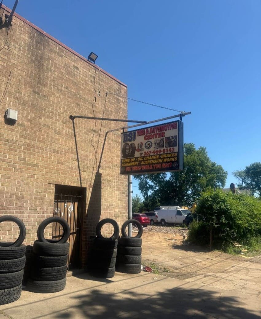 DSJ Tire & Automotive Center exterior building with storefront sign