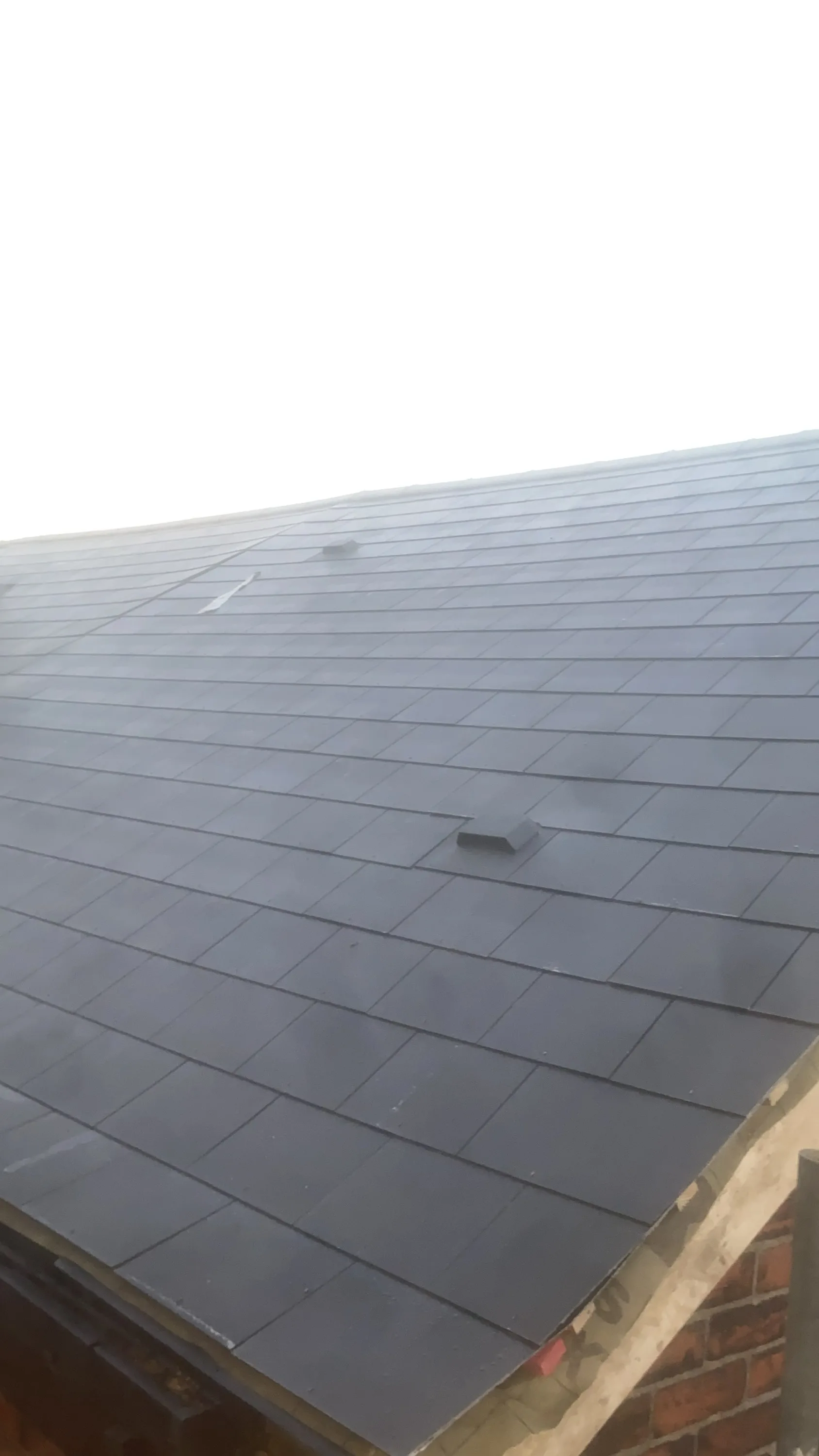 After: Vertical Slate Cladding & Breathable Membrane Installation by Wales Roofing in Sheffield