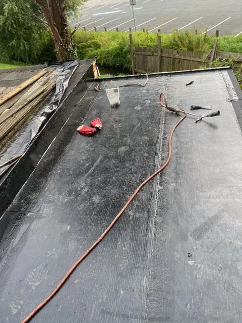 Before: Rear Extension Flat Roof Replacement & Torch-On System by Wales Roofing in Sheffield