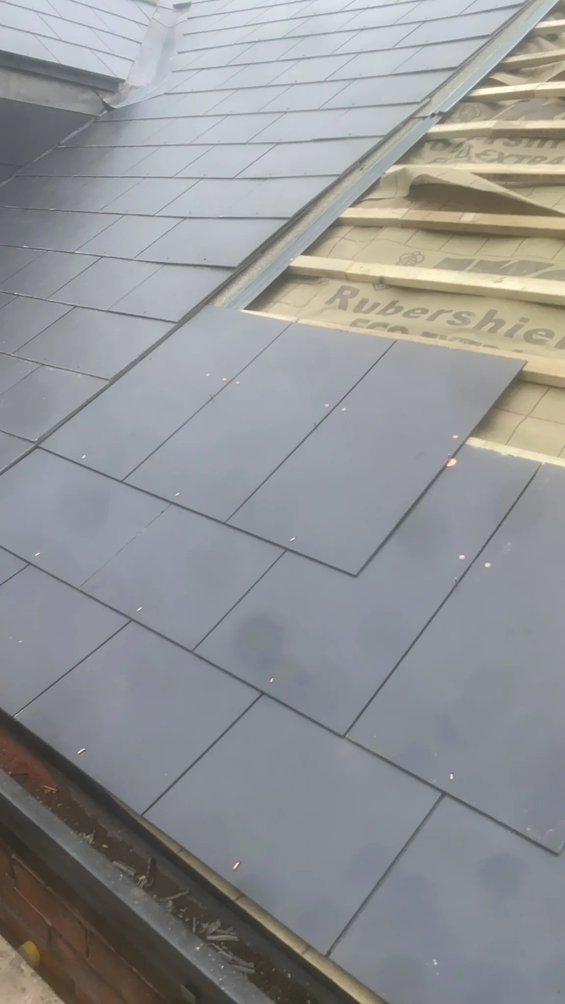 Before: Vertical Slate Cladding & Breathable Membrane Installation by Wales Roofing in Sheffield