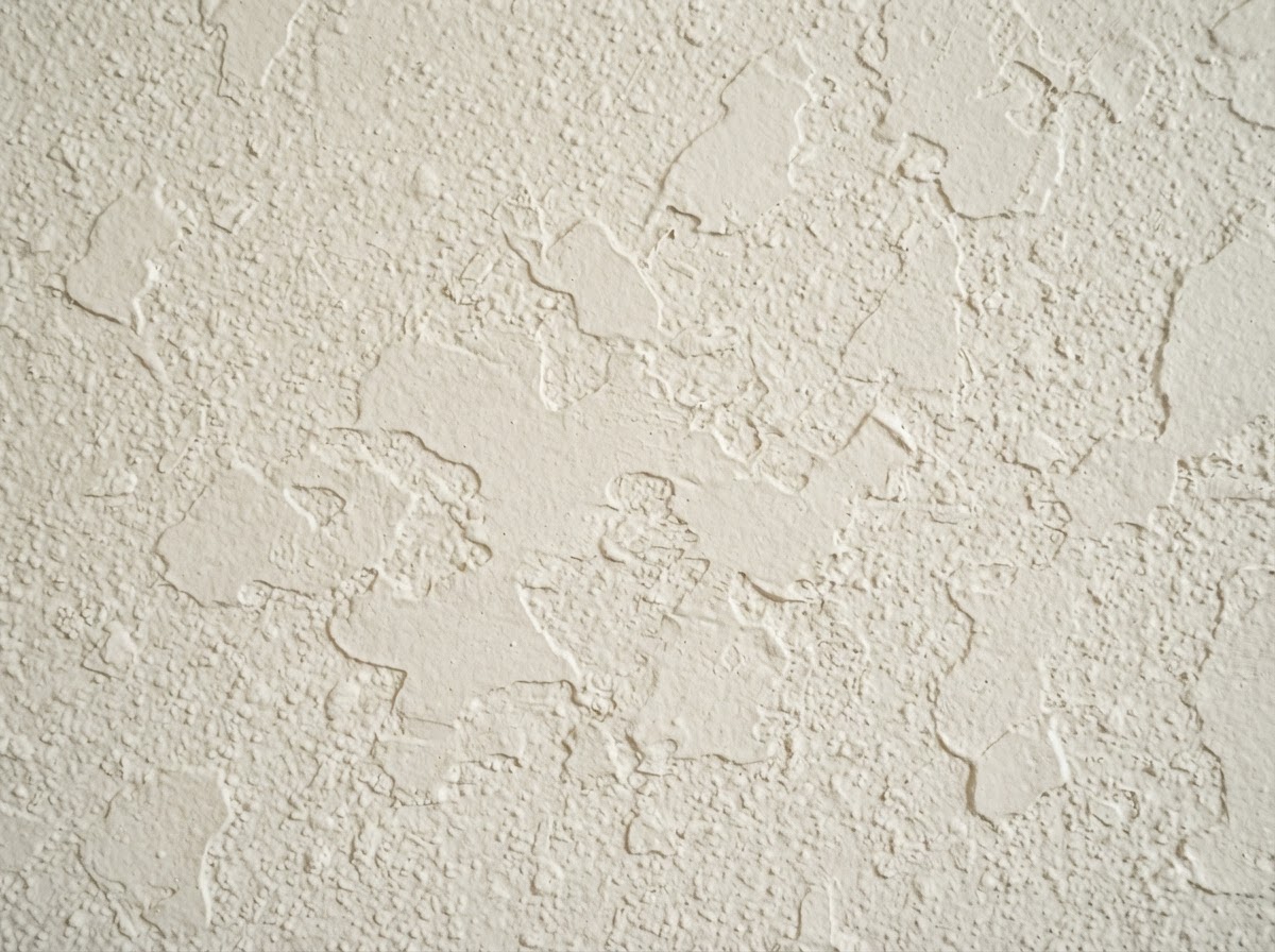 Orange peel and knockdown texture detail on a finished drywall wall