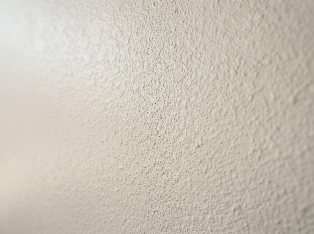 Orange-peel drywall texture on a finished interior wall
