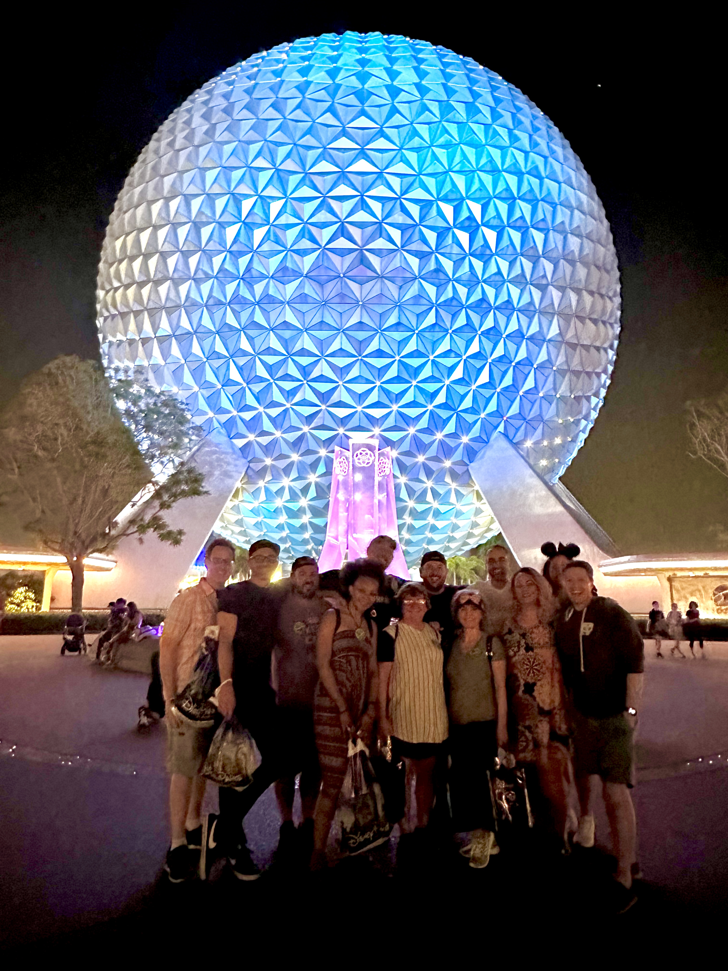 Florida Discovery Adventure - Group in front of illuminated EPCOT Spaceship Earth