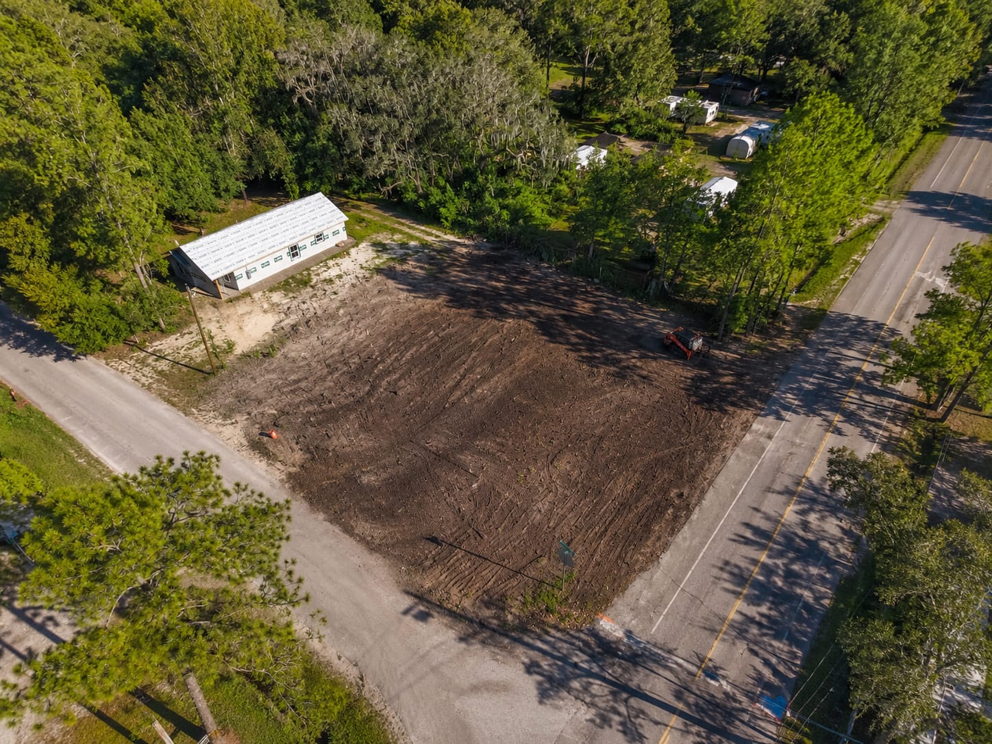 Completed lot clearing and property site preparation ready for new construction by M. & P. Tree Service in Georgia