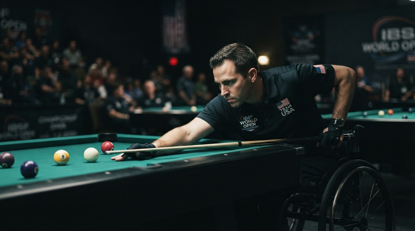Kray Mims lining up a shot at a billiards table from his wheelchair, dramatic lighting
