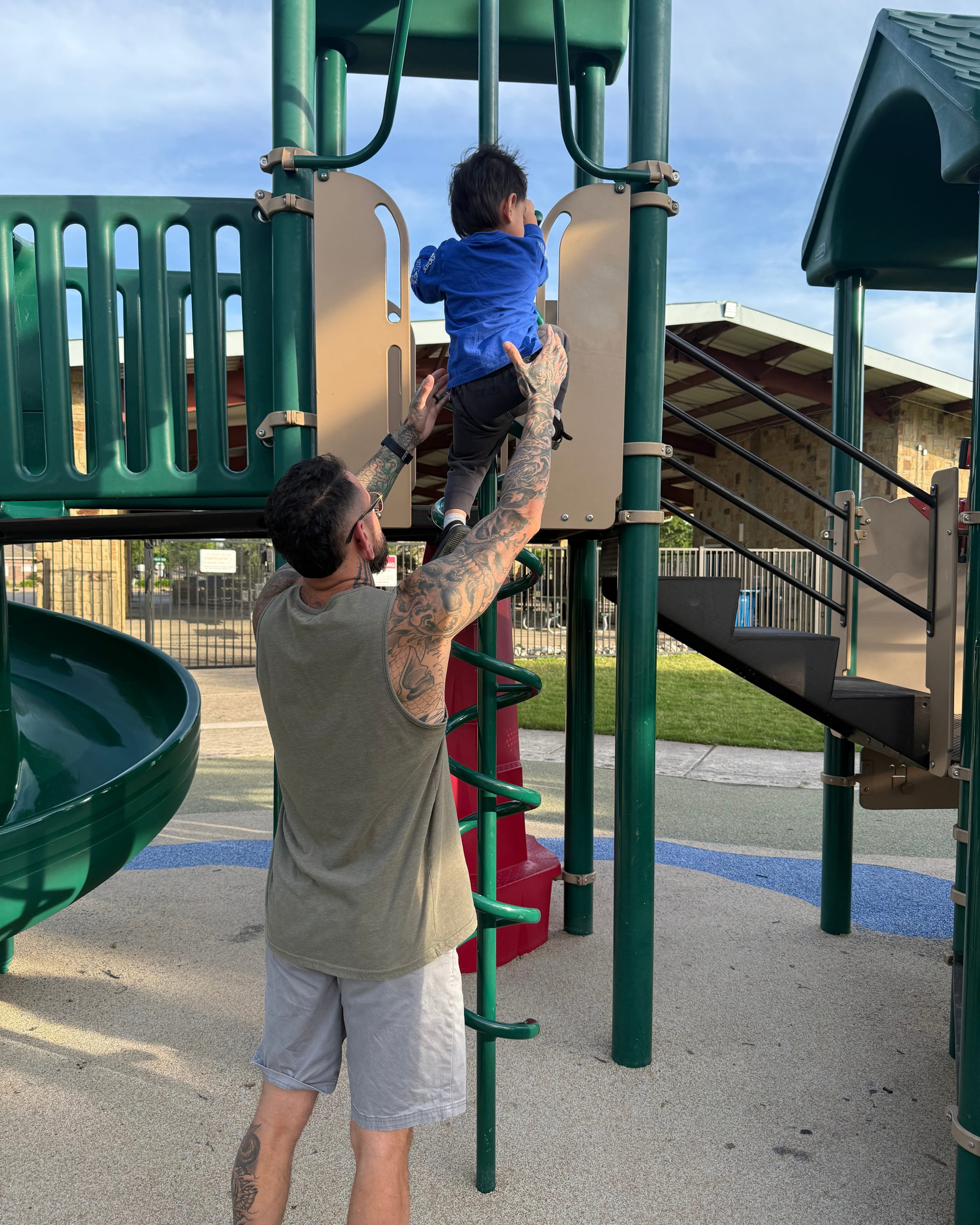 Sam Rodriguez supporting his young son at the playground