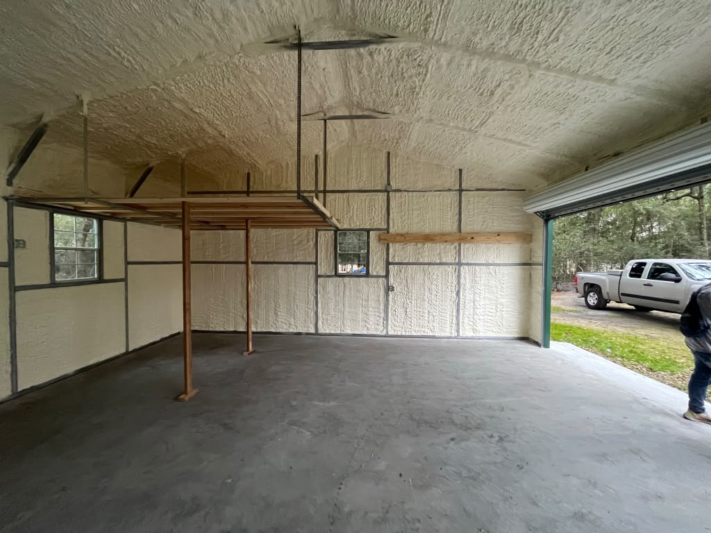 Pole barn workshop spray foam insulation with suspended storage loft and concrete floor in Statesboro GA