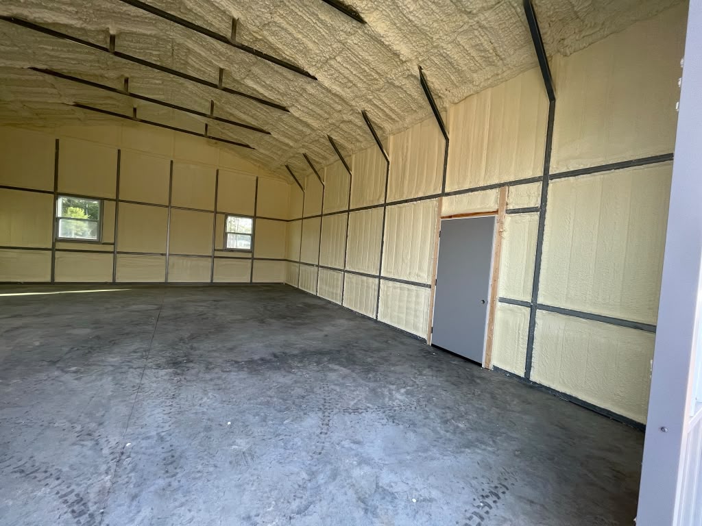 Full industrial building spray foam seal on walls and roofline in Charleston SC
