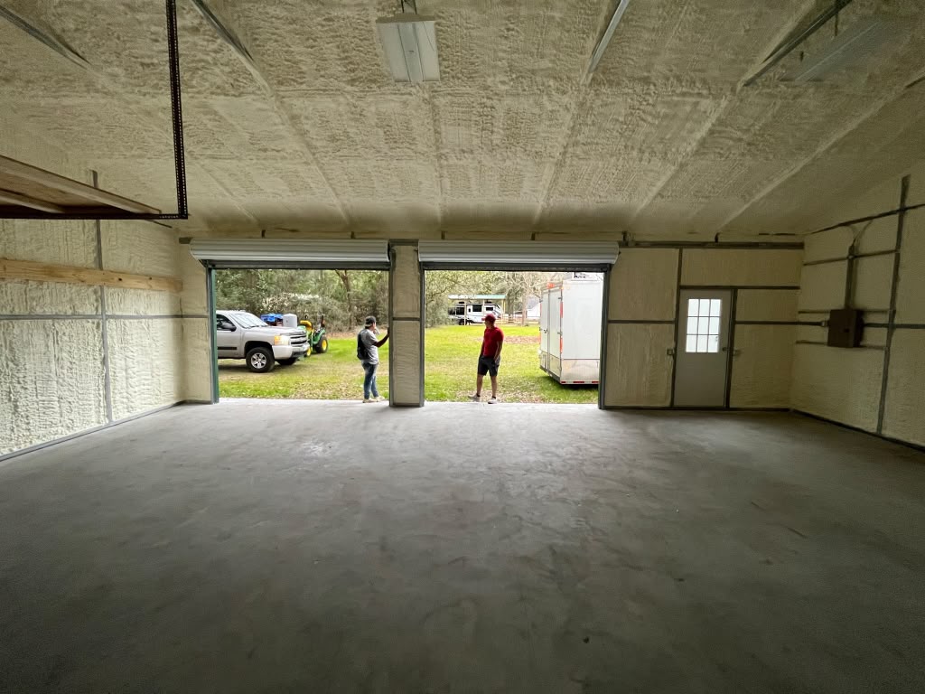 Dual roll-up bay door commercial outbuilding with complete spray foam insulation in Savannah GA