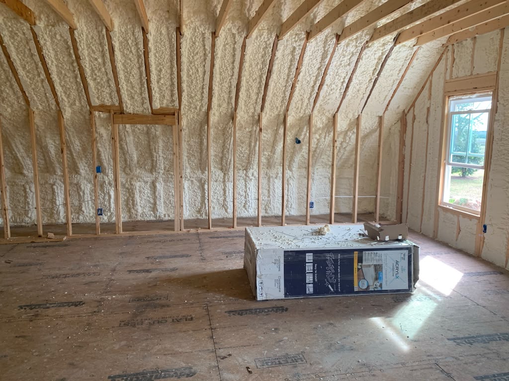 Spray foam on sloped ceiling and knee walls in bonus room by Coastal Synergy in Bluffton SC